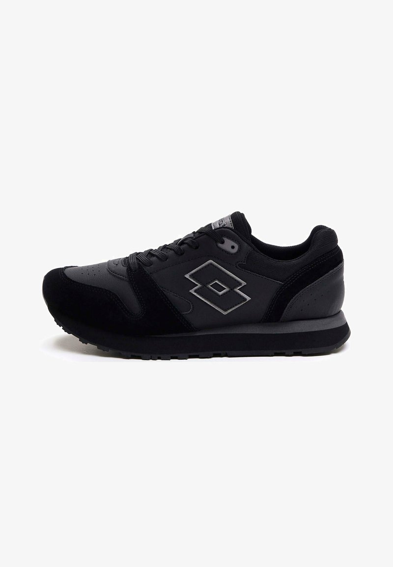 Black athletic shoe with a suede and mesh upper, round toe, lace-up front, padded collar, and rubber outsole. Features a silver logo.