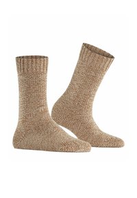 Brązowe skarpetki wykonane z przędzy, z ściągaczem, posiadające teksturowany, ciepły wzór. Długość do kostki, o solidnym i wygodnym dopasowaniu.