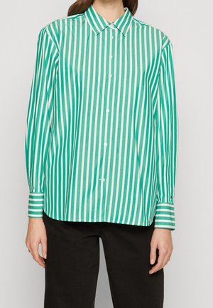 Green and white striped button-up shirt with a collar, long sleeves, and cuffs featuring horizontal stripes. Soft fabric, relaxed fit.