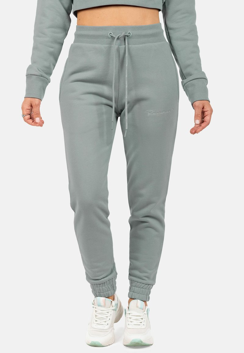 Lichtgroene joggingbroeken van zacht materiaal, met een elastische tailleband met trekkoord, zijzakken en aansluitende boorden.