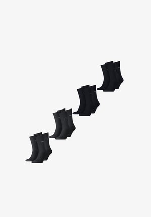 Schwarze Socken, paarweise angeordnet, mit glatter Textur, Knöchelhöhe und einem kleinen kontrastierenden Logo auf jeder Socke.
