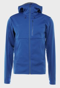 Giacca softshell blu con cappuccio foderato, tasca anteriore con zip e polsini elasticizzati. Tessuto morbido e design aderente adatto per l'uso all'aperto.