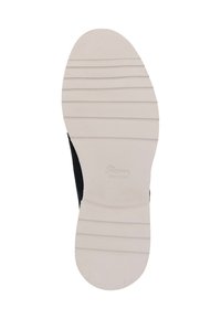 Tige de chaussure noire avec une texture lisse, dotée d'une semelle en caoutchouc blanche. La semelle présente des nervures horizontales pour une meilleure traction. Logo de la marque visible sur la semelle.