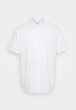 Hvit kortermet skjorte med knapp, laget av lett stoff. Har klassisk krage, rett fald og subtil tekstur.