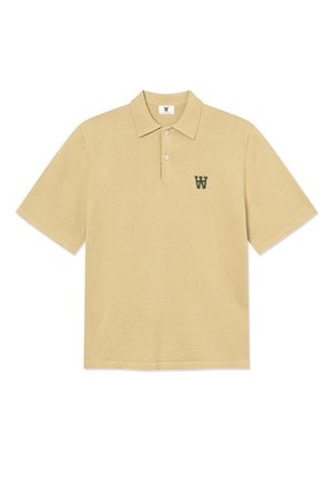 Beige short-sleeve polo shirt with two buttons and a small green "W" logo on the left chest.