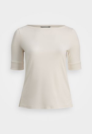 Top de manga corta color crema hecho de una tela suave. Cuenta con un escote redondo y puños enrollados, con un ajuste ligeramente holgado y dobladillo recto.