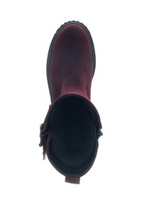Burgundy suede ankle boot with a rounded toe and black rubber outsole. Features a side buckle and a soft, textured interior lining.