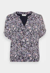 Blusa floral de mangas curtas em azul marinho escuro, com um padrão vibrante de manchas em rosa, branco e azul; escote em V e textura de tecido suave.