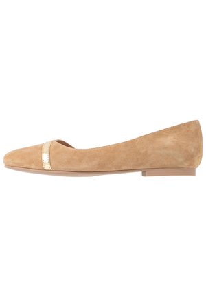 Beige suede ballet flats with a rounded toe and a metallic accent band at the vamp, featuring a flexible rubber sole for comfort.