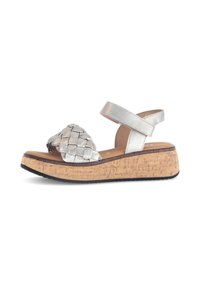 Silver woven strap sandal with a cork wedge sole, featuring an adjustable ankle strap and smooth leather finish.