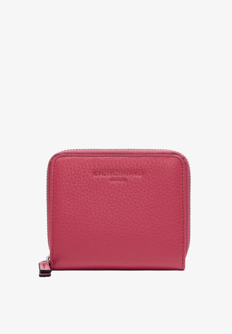 Pink leather wallet with a textured surface, rounded shape, zip closure, and embossed brand name on the front. Compact and functional design.