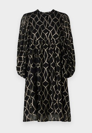 Melnas kleitas ar zeltainu ģeometrisku rakstu, garām puff piedurknēm, apaļu kakla izgriezumu un plūstošu siluetu. Vieglas, caurredzamas audums.