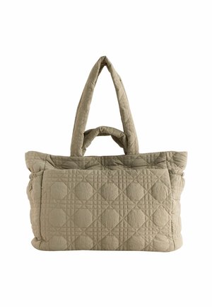 Beige gestepptes Tragetasche mit großen, kreisförmigen Steppmuster, ausgestattet mit zwei kurzen Griffen und zwei längeren Schulterriemen.