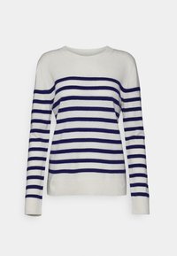 Pull rayé en tissu doux. Présente des rayures bleu marine sur un fond blanc, un col rond et des manches longues.