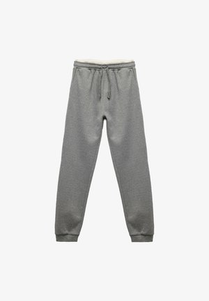 Graue Sweatpants aus strukturiertem Material, mit elastischem Bund, Kordelzugverschluss und gerippten Bündchen. Entworfen für Komfort und legere Freizeitkleidung.