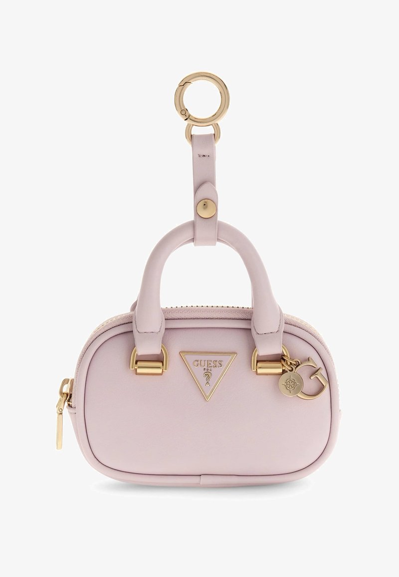 Petit porte-clés sac à main Guess rose pâle avec double poignée, fermeture éclair dorée, plaque logo et pendentif doré avec la lettre "G".