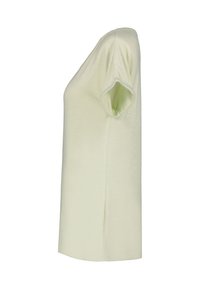 Camiseta de manga corta verde claro con un corte relajado, hecha de una tela suave y texturizada. Presenta un escote redondo y aberturas en los laterales.