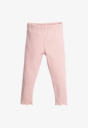Miękkie różowe legginsy dla małego dziecka z elastycznym pasem i falbanami u dołu, ułożone płasko na białym tle.