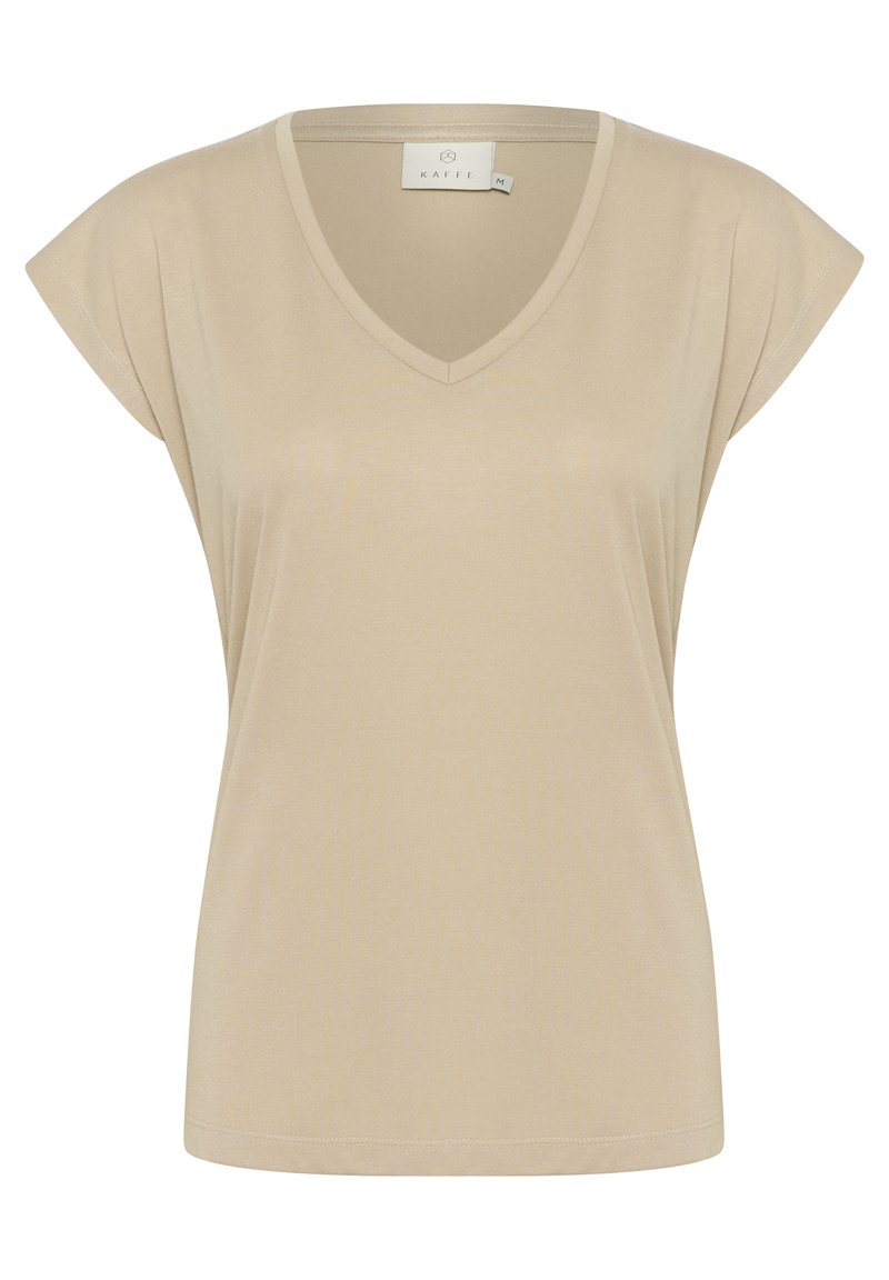 T-shirt beige à col en V avec des manches courtes et épaules recouvrantes, de coupe décontractée. Fabriqué en tissu léger et lisse avec des détails de couture minimalistes.
