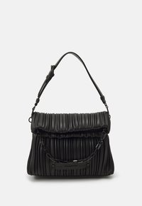 Black leather handbag featuring a pleated design, a chain accent, and a curved top flap. Adjustable strap for versatile carrying options.