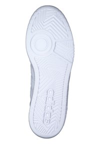 Vit gummisko sula med zigzag- och cirkulära mönster. Har "adidas"-logotypen präglad nära hälen. Slät yta totalt sett.