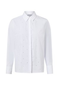 White long-sleeve shirt with a button-down collar, featuring a pattern of small, silver embellishments across the front. Smooth fabric texture.
