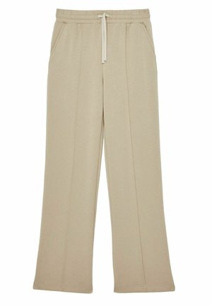 Pantaloni da tuta beige a gamba larga con vita regolabile, due tasche laterali e materiale in cotone morbido. Texture liscia e taglio dritto.