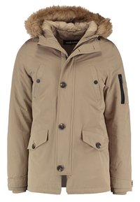 Giacca impermeabile beige con cappuccio foderato in pelliccia, bottoni frontali, grandi tasche a toppa e tasca con zip sulla manica. Tessuto strutturato.