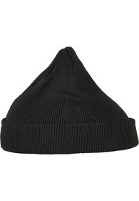 Crna pletena kapa s rebrastom teksturom, suženim vrhom i preklopnim rubom. Materijal izgleda mekano i rastezljivo, pogodno za toplinu.
