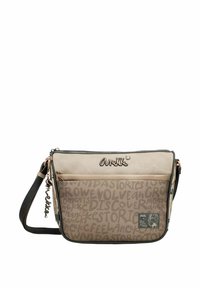 Bolso bandolera beige con una sección superior lisa y una sección inferior con estampado. Cuenta con detalles en oro rosado, un charm desmontable y una correa ajustable.
