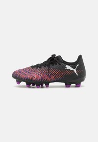 Football boots featuring a black upper with vibrant purple and orange zigzag patterns, textured surface, and purple sole studs for traction.