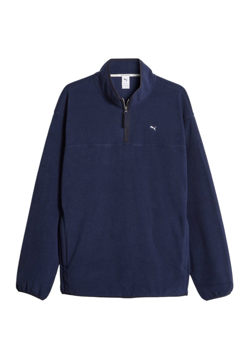 Pullover in pile blu navy con colletto alto, mezza zip e accento con logo. Presenta maniche lunghe con polsini elasticizzati e una texture morbida.