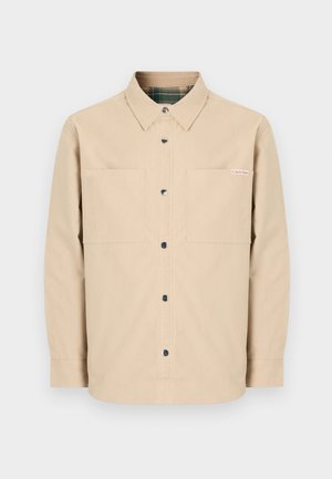 Chemise beige boutonnée avec deux poches avant, boutons noirs et col intérieur à carreaux. Design simple avec un ourlet droit.