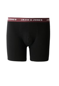 Schwarze Herren-Boxershorts mit bordeauxrotem Gummibund, der den weißen Schriftzug "JACK & JONES" zeigt, vor einem weißen Hintergrund präsentiert.
