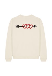 Felpa color crema con un design ricamato di tre cuori rosse collegate da una freccia nera sul retro.