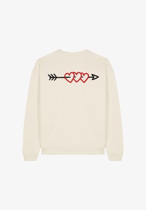 Felpa color crema con un design ricamato di tre cuori rosse collegate da una freccia nera sul retro.