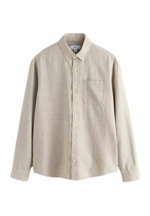 Light beige long-sleeve button-up shirt made of textured fabric. Features a single chest pocket and a classic collar design.