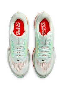 Light green athletic shoes with a mesh upper, white perforated sections, bright red insoles, and an orange accent on the sole. Silver logo detail.