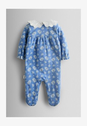 Sinine lilleline romper pikkade varrukatega, valgest pitsist krae ja elastsete äärtega. Omab väikeseid valgeid lillemustreid pehmel materjalil.