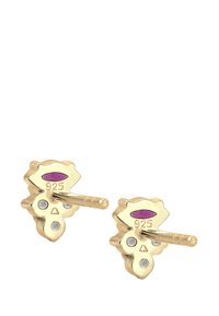Boucles d'oreilles en métal doré en forme de feuilles, avec un accent violet et de petites pierres blanches. Marquées "925" pour de l'argent sterling.