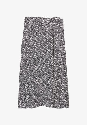 Fließender Rock in Schwarz und Weiß mit aufwendigen Paisleymustern. Das Material ist leicht und hat eine glatte Textur. Einzelne Faltenlegung ist vorhanden.