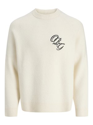 Kreminės spalvos megztinis su gipiūrinėmis rankovėmis ir apačia, kuriame yra juodas siuvinėjimas kairėje pusėje. Apvalus kaklas, laisvas siluetas.