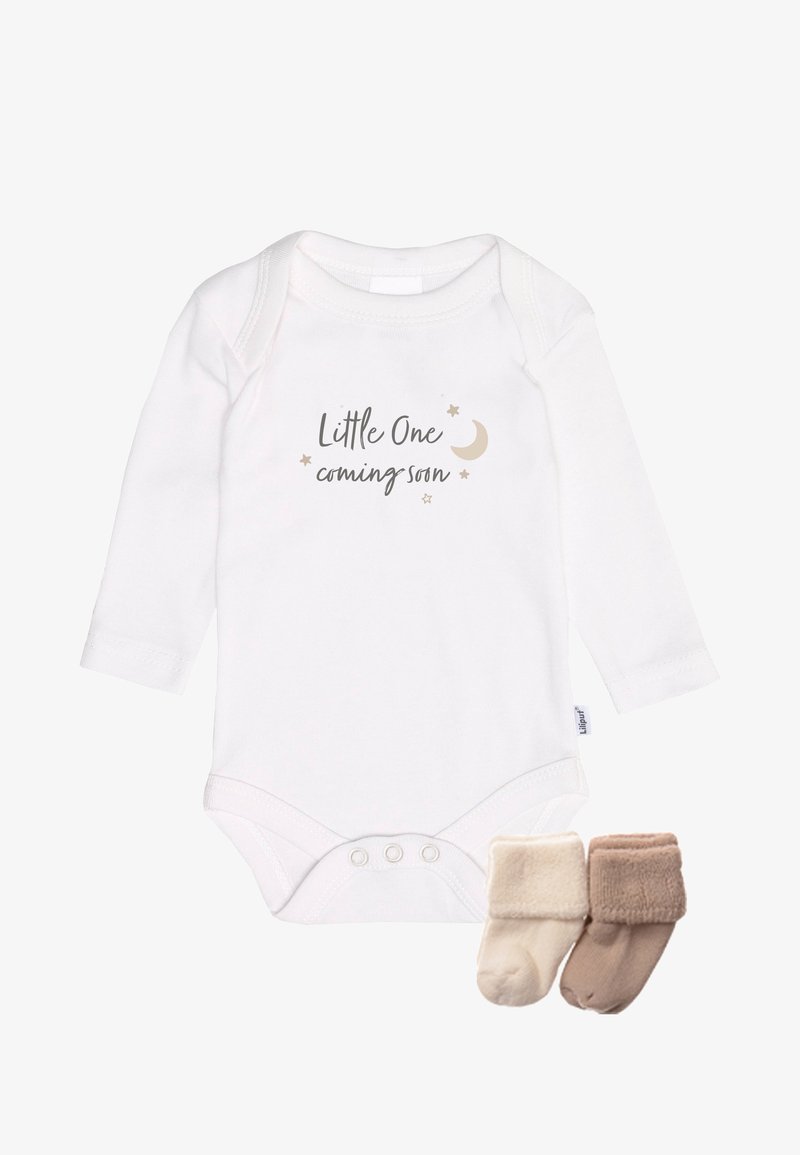 White long-sleeve baby onesie with "Little One coming soon" text, a crescent moon, stars, and beige and brown baby socks.