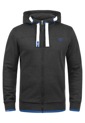 Felpa grigia con zip, cappuccio regolabile con cordino, accenti bianchi e blu, tasche laterali e polsini a costine. Presenta un logo sul petto.