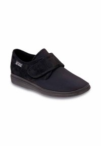 Czarne buty na rzepy z miękkiego zamszu, okrągłym noskiem i niską gumową podeszwą. Posiadają teksturowany pasek zapewniający pewne dopasowanie.
