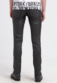 Freeman T. Porter Tygbyxor - black