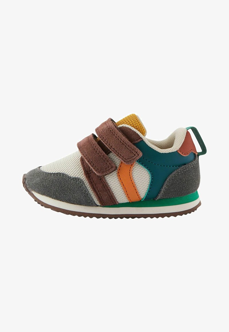 Multicolored sneaker with a mesh upper, featuring brown suede straps, green and orange accents, and a textured gray toe cap. Contains a rubber sole.