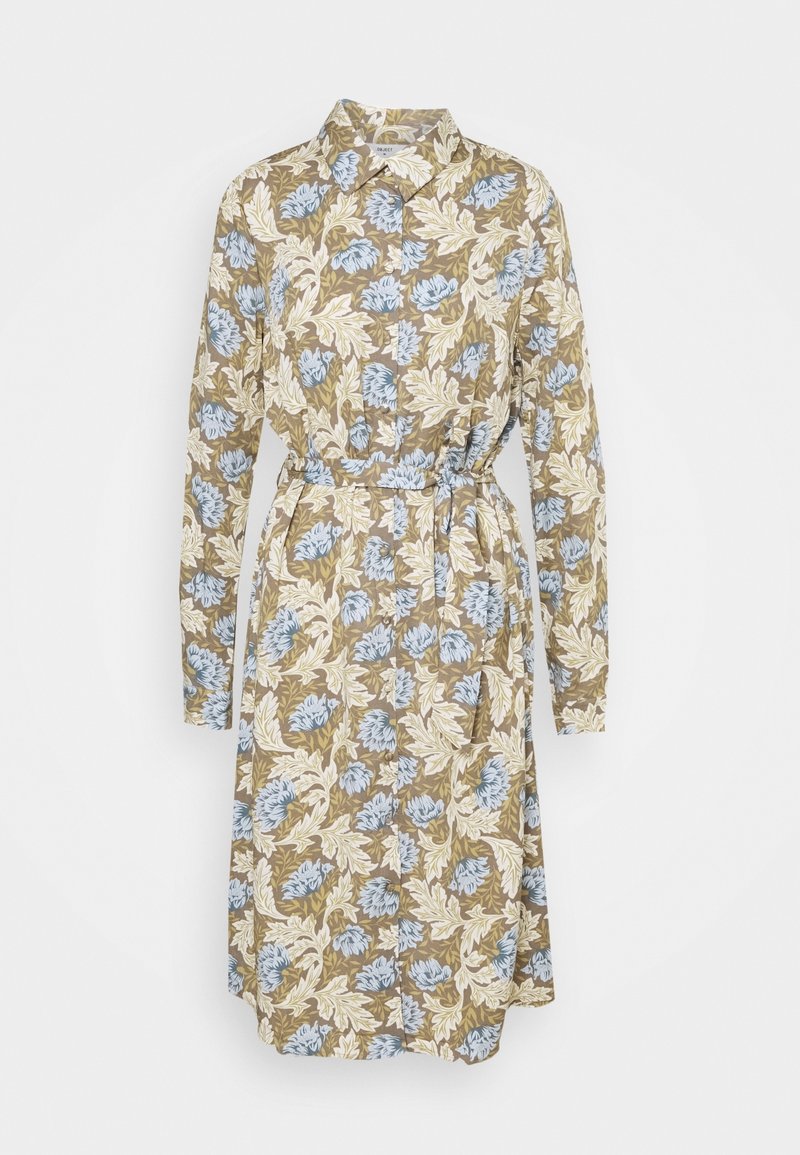 Vestito camicia a maniche lunghe con motivo floreale beige, bianco e azzurro chiaro, vita con cintura e chiusura frontale con bottoni.