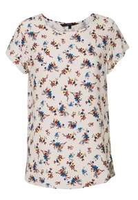 Kortärmad topp i ljus beige tyg med ett blommönster som har röda, blå och gula blommor. Rundad halsringning och sprund i kanten.