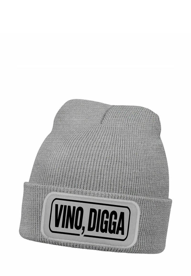 Gray knitted beanie with a fold-up cuff featuring a rectangular patch that displays the text “VINO, DIGGA” in bold black font.